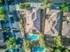 Birds-eye view of the home featuring a private backyard pool, mature landscaping, and a patio at 3 Chatmoss Rd, Henderson, NV 89052