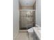 Bathroom featuring shower, contemporary toilet and sleek single sink vanity at 3 Chatmoss Rd, Henderson, NV 89052