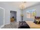 Well-lit bedroom showcasing natural light and views to the additional sitting area at 3 Chatmoss Rd, Henderson, NV 89052