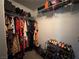 Well-organized walk-in closet with shelves and hanging space for clothes and accessories at 3 Chatmoss Rd, Henderson, NV 89052