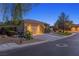Charming street view of a single-story home with a two-car garage at 3 Chatmoss Rd, Henderson, NV 89052