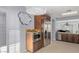 Kitchen features stainless steel appliances, custom wood cabinets, and modern design at 3 Chatmoss Rd, Henderson, NV 89052