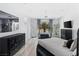 Main bedroom featuring a round bed, modern decor, and large window views at 3 Chatmoss Rd, Henderson, NV 89052