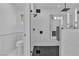 Modern bathroom boasts a glass enclosed shower with black fixtures and marble tile at 3109 Siena Cir, Las Vegas, NV 89128