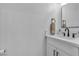Modern bathroom features a sleek vanity, minimalist mirror, and stylish fixtures at 3109 Siena Cir, Las Vegas, NV 89128