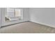 Cozy bedroom with a plush window seat, neutral carpet, and a bright window, creating a tranquil space at 3109 Siena Cir, Las Vegas, NV 89128
