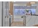 Bright kitchen with stainless steel appliances, island seating, and modern finishes at 3109 Siena Cir, Las Vegas, NV 89128