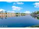 Beautiful lake reflecting upscale residences, lush landscaping and picturesque water at 3109 Siena Cir, Las Vegas, NV 89128