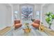 Cozy sitting area with oversized window, stylish decor, and comfortable seating at 3109 Siena Cir, Las Vegas, NV 89128