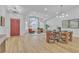 Bright, open living and dining space with updated flooring and stylish furnishings at 3109 Siena Cir, Las Vegas, NV 89128