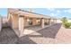Covered patio extends the living space outdoors, with desert landscaping for easy maintenance at 3436 Camsore Point Ln, Las Vegas, NV 89129