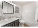 Bathroom with a tub and shower combination and a vanity with storage at 3436 Camsore Point Ln, Las Vegas, NV 89129