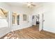 Bright room boasts wood floors and large windows offering ample natural light at 3436 Camsore Point Ln, Las Vegas, NV 89129