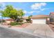 Lovely single-story home with a well-maintained lawn, desert landscaping, and a driveway at 3436 Camsore Point Ln, Las Vegas, NV 89129
