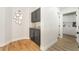 Hallway featuring built-in cabinets and decor at 3436 Camsore Point Ln, Las Vegas, NV 89129