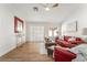 Bright open living room with hardwood floors, sliding door and modern decor at 3436 Camsore Point Ln, Las Vegas, NV 89129