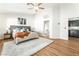 Sunlit main bedroom features a ceiling fan and entry to the bathroom at 3436 Camsore Point Ln, Las Vegas, NV 89129