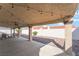 Covered patio perfect for outdoor seating and entertaining, surrounded by desert landscaping at 3436 Camsore Point Ln, Las Vegas, NV 89129