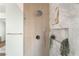 Stylish shower featuring modern fixtures, and marble wall tiles at 3436 Camsore Point Ln, Las Vegas, NV 89129