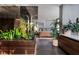 Tastefully decorated bedroom with modern finishes, including ample greenery and wood accents, enhancing a calming atmosphere at 353 E Bonneville Ave # 1302, Las Vegas, NV 89101