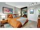 Cozy bedroom featuring stylish decor, comfortable bedding, and modern artwork at 353 E Bonneville Ave # 1302, Las Vegas, NV 89101