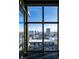 Stunning city view through large windows, capturing the vibrant Las Vegas skyline at 353 E Bonneville Ave # 1302, Las Vegas, NV 89101