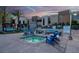 Community hot tub and lounge area with comfortable seating and modern landscaping at 353 E Bonneville Ave # 1302, Las Vegas, NV 89101