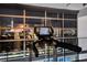 Modern treadmill with city views in the residential building fitness center, perfect for cardio workouts at 353 E Bonneville Ave # 1302, Las Vegas, NV 89101