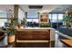 Sleek kitchen with countertop seating, modern lighting, and a view of the Las Vegas skyline at 353 E Bonneville Ave # 1302, Las Vegas, NV 89101