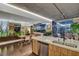 Bright living room featuring floor-to-ceiling windows with city views, modern furniture, and stylish décor at 353 E Bonneville Ave # 1302, Las Vegas, NV 89101