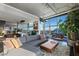 Open-concept living room showcasing modern design, city views, and seamless flow to other areas at 353 E Bonneville Ave # 1302, Las Vegas, NV 89101
