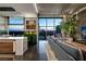 Elegant living area with city skyline views, a comfortable sofa, and a modern, open-concept design at 353 E Bonneville Ave # 1302, Las Vegas, NV 89101
