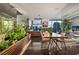 Stylishly furnished living room with an open-concept design, wood floors, and abundant natural light at 353 E Bonneville Ave # 1302, Las Vegas, NV 89101