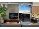 Modern living room with floor to ceiling windows and city views, next to open kitchen at 353 E Bonneville Ave # 1302, Las Vegas, NV 89101