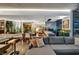 Spacious open living space with a contemporary design, including a kitchen, dining area, and comfortable seating at 353 E Bonneville Ave # 1302, Las Vegas, NV 89101