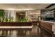 Contemporary living space featuring sleek modern design, greenery, and an open concept layout at 353 E Bonneville Ave # 1302, Las Vegas, NV 89101