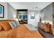 Bright main bedroom with dark wood flooring and furniture, featuring an attached bathroom at 353 E Bonneville Ave # 1302, Las Vegas, NV 89101