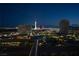Breathtaking nighttime view of the Las Vegas Strip from balcony of condo with bright city lights at 353 E Bonneville Ave # 1302, Las Vegas, NV 89101