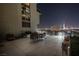 A spacious outdoor terrace with a variety of seating options, perfect for entertaining at 353 E Bonneville Ave # 1302, Las Vegas, NV 89101