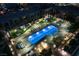 Aerial view of a swimming pool area with lounge seating, manicured landscape, and community features in the building at 353 E Bonneville Ave # 1302, Las Vegas, NV 89101