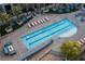 Aerial view of a luxurious pool and recreation area, complete with lounge chairs and cabanas for relaxation at 353 E Bonneville Ave # 1302, Las Vegas, NV 89101