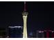 The Stratosphere tower, a defining feature of the Las Vegas skyline, illuminated at night at 353 E Bonneville Ave # 1302, Las Vegas, NV 89101