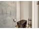 Small toilet room featuring gray wall and smart toilet at 353 E Bonneville Ave # 1302, Las Vegas, NV 89101
