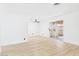 Bright living room featuring a ceiling fan and sliding glass door at 3654 Villa Knolls South Dr, Las Vegas, NV 89120
