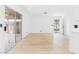 Living room with vinyl floors and a sliding glass door to the backyard at 3654 Villa Knolls South Dr, Las Vegas, NV 89120