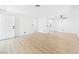 Bright living room featuring new vinyl floors and fresh paint at 3654 Villa Knolls South Dr, Las Vegas, NV 89120