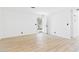 Bright living room featuring new vinyl floors and fresh paint at 3654 Villa Knolls South Dr, Las Vegas, NV 89120
