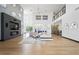 Bright, open-concept living room with high ceilings, stylish decor, and plenty of natural light at 3740 Caesars Cir, Las Vegas, NV 89120