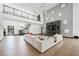 Spacious living room featuring high ceilings, a modern fireplace, and plenty of room to relax and entertain at 3740 Caesars Cir, Las Vegas, NV 89120