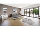 Spacious main bedroom with natural light, a sliding glass door, and modern decor at 3740 Caesars Cir, Las Vegas, NV 89120
